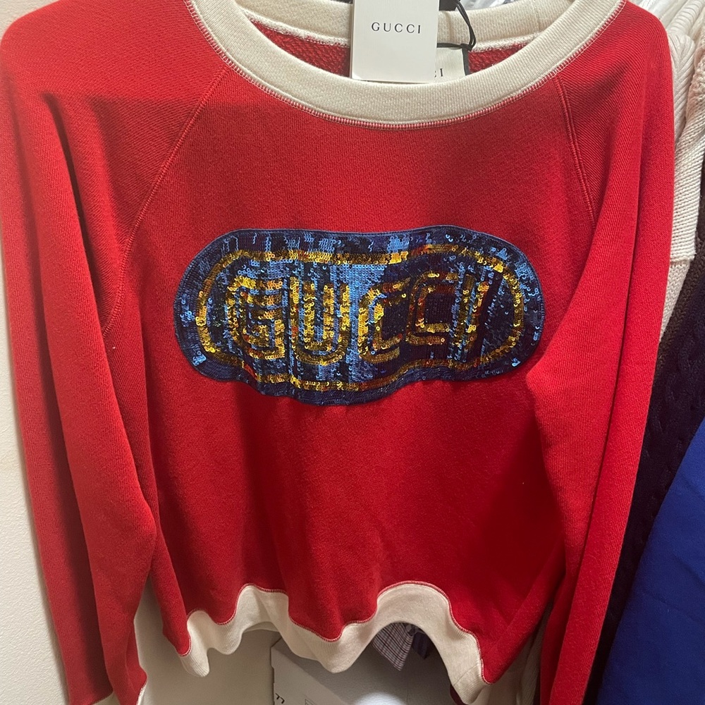 Red Gucci sweater